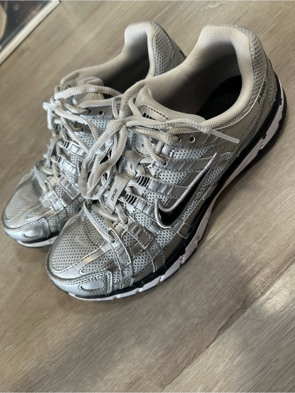 Nike Women’s P-6000 Silver and Black Sneakers